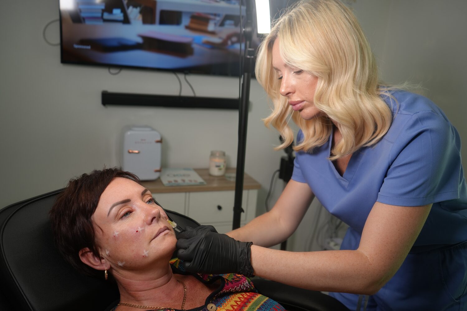 Becci, NMC registered nurse, treating a client at The Face Lab